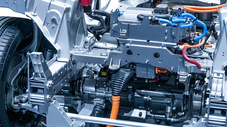 The complex electronic architectures of hybrid and electric vehicles have required engineers to rethink power requirements. Here's why 48V DC systems are key to modern automotive systems, and some considerations on powertrain component selection.