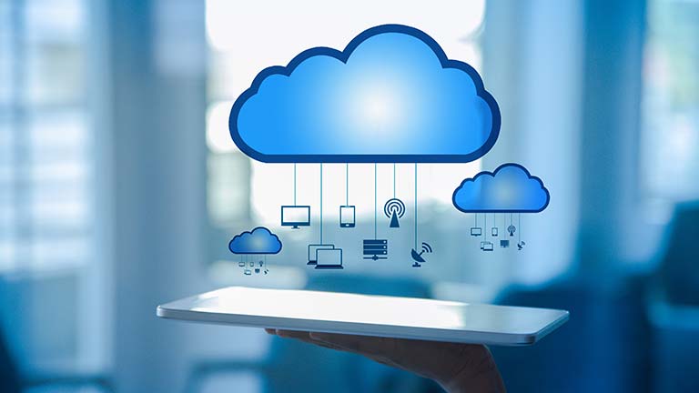 tablet with iCloud image and IoT icons 