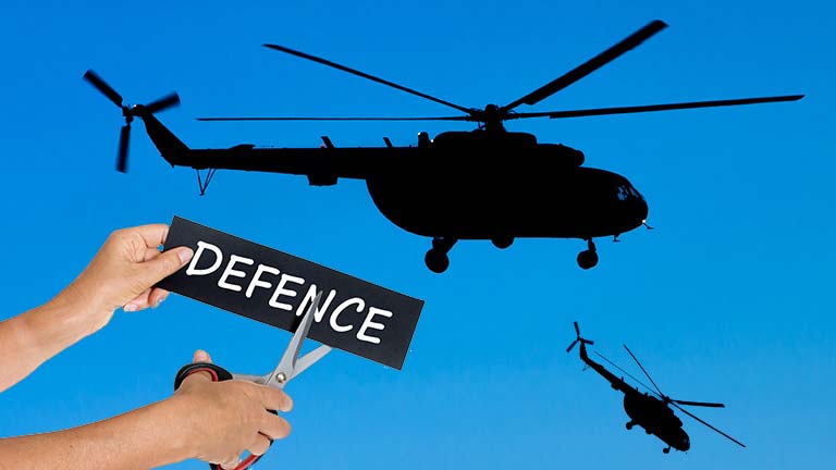 Defense budget being cut with helicopters falling out of the sky in the background