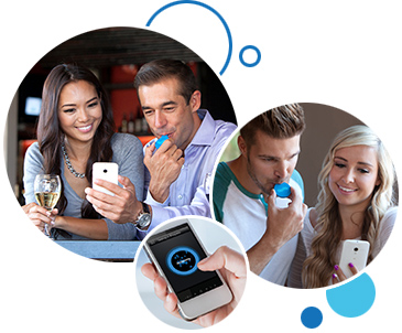 bubbles with smiling people looking using the Breeze breathalyzer and viewing the results in a smart phone