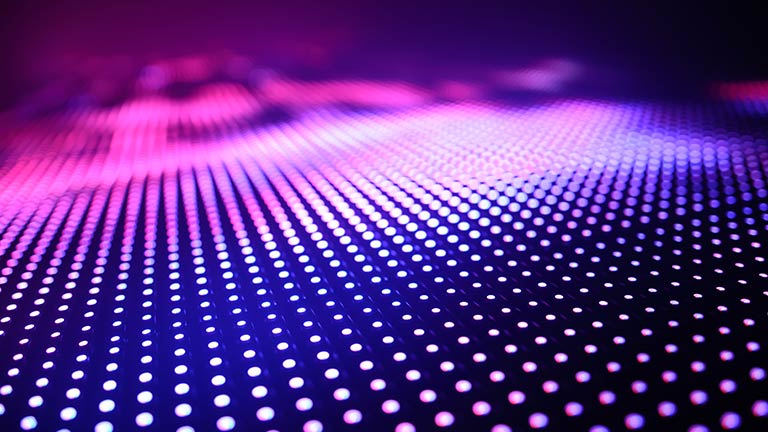 field of linear dots on blue background