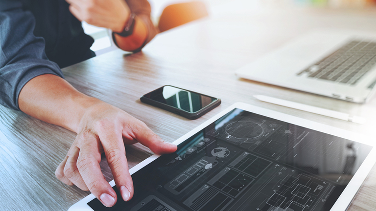 man using tablet computer