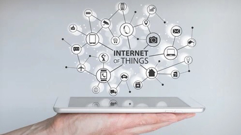 conceptual image of tablet with connected IoT icons on top
