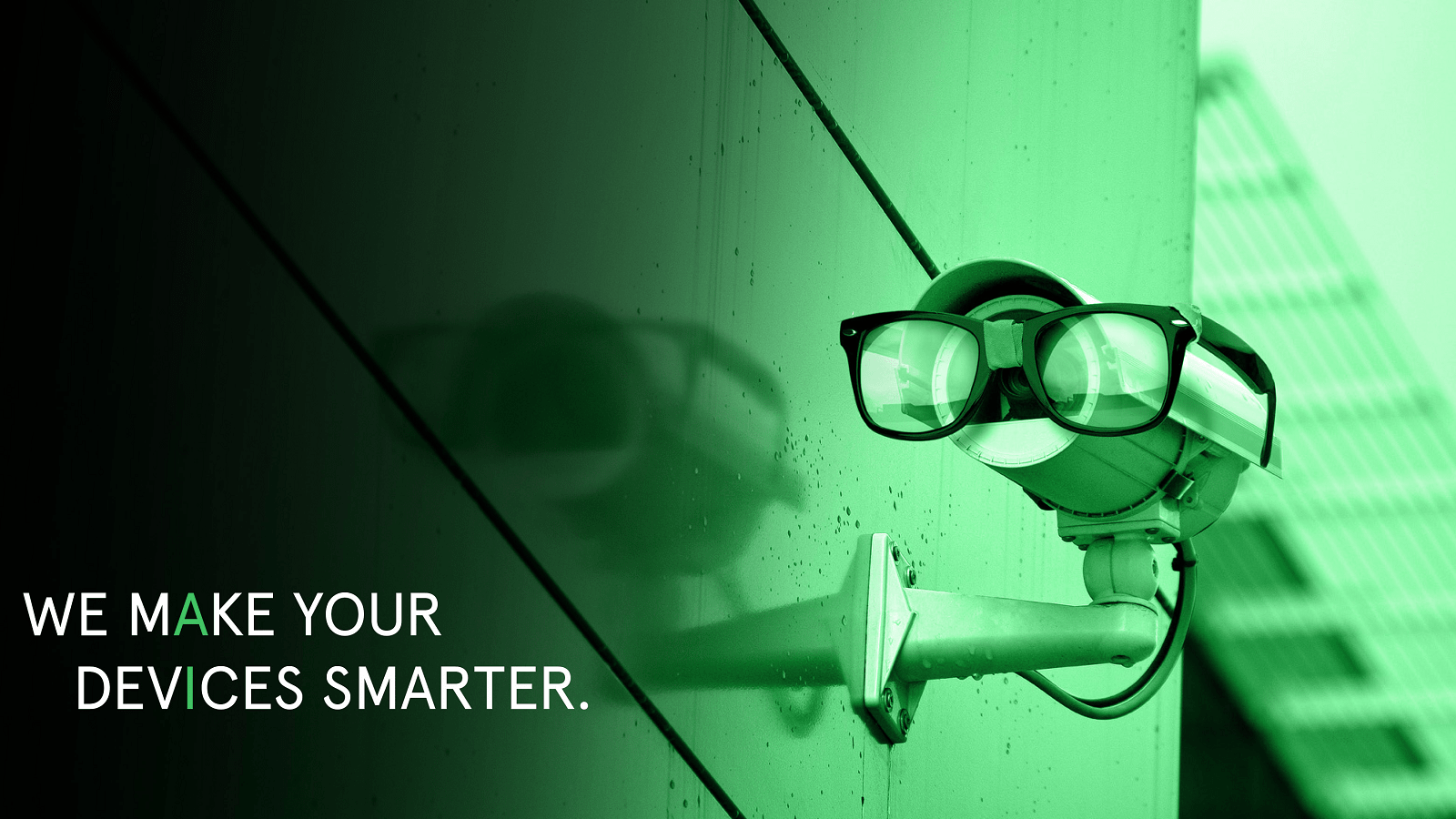 Surveillance camera wearing glasses. Text reads: We Make you Devices Smarter with AI Surveillance camera wearing glasses. Text reads: We Make you Devices Smarter with AI