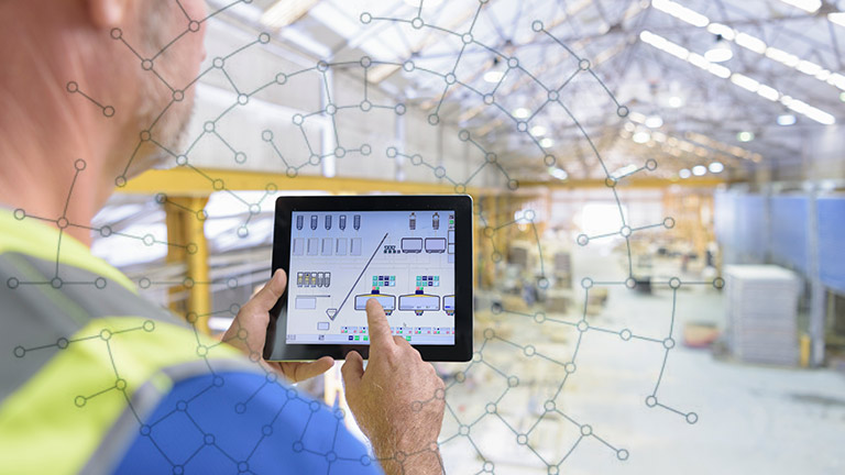 man holding tablet computer