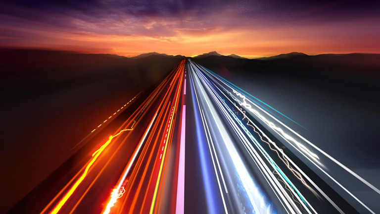 timelapse image of sunset with vehicle lights