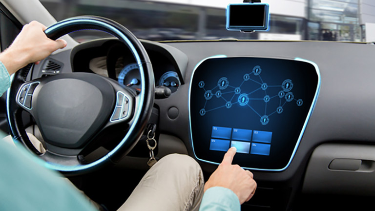 Man navigating an IoT car dashboard