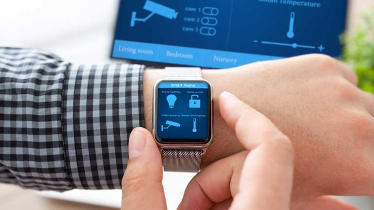 Person controlling building security via mobile device