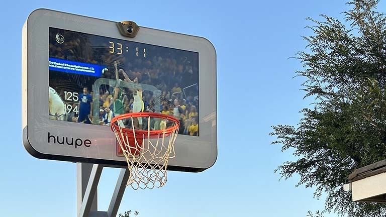 Outdoor installation of huppe basketball hoop can weather the elements.