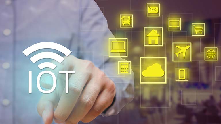 Graphic of a person using IoT for several applications
